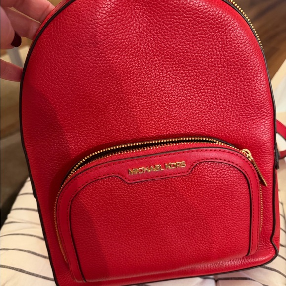 Michael Kors Jaycee Medium Backpack in a bright red pebbled leather main image 10